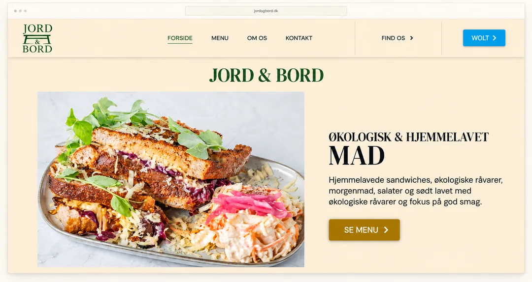 Jord & Bords forside med økologisk mad, knappen Se menu og et Wolt-link i menuen